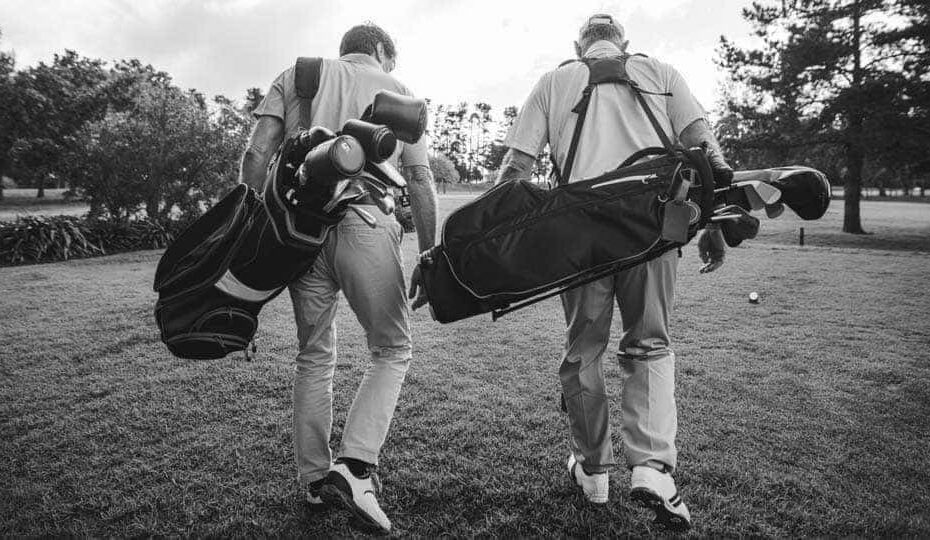 Golfer Carrying Bags (2)
