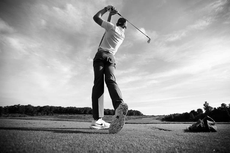 Golfer Swinging Club 28