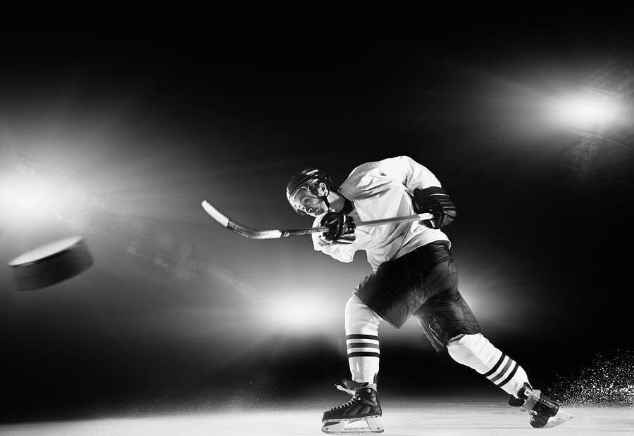 Hockey Player Shooting Puck 2